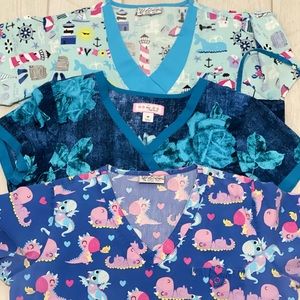 Lot of 3 medium print scrub tops